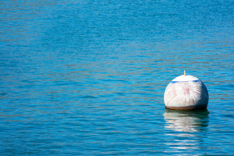 Safety buoy marking marine project boundaries in open coastal waters